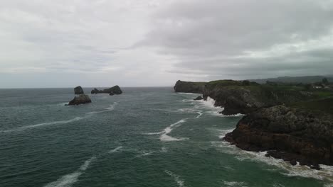 Cantabrian-cliff-coastline-Spain-aerial-with-waves-crashing-on-rocks