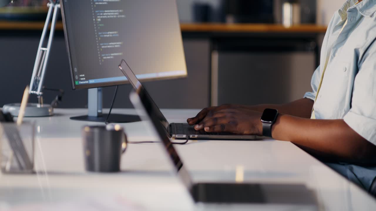 Programmer Working on Computer