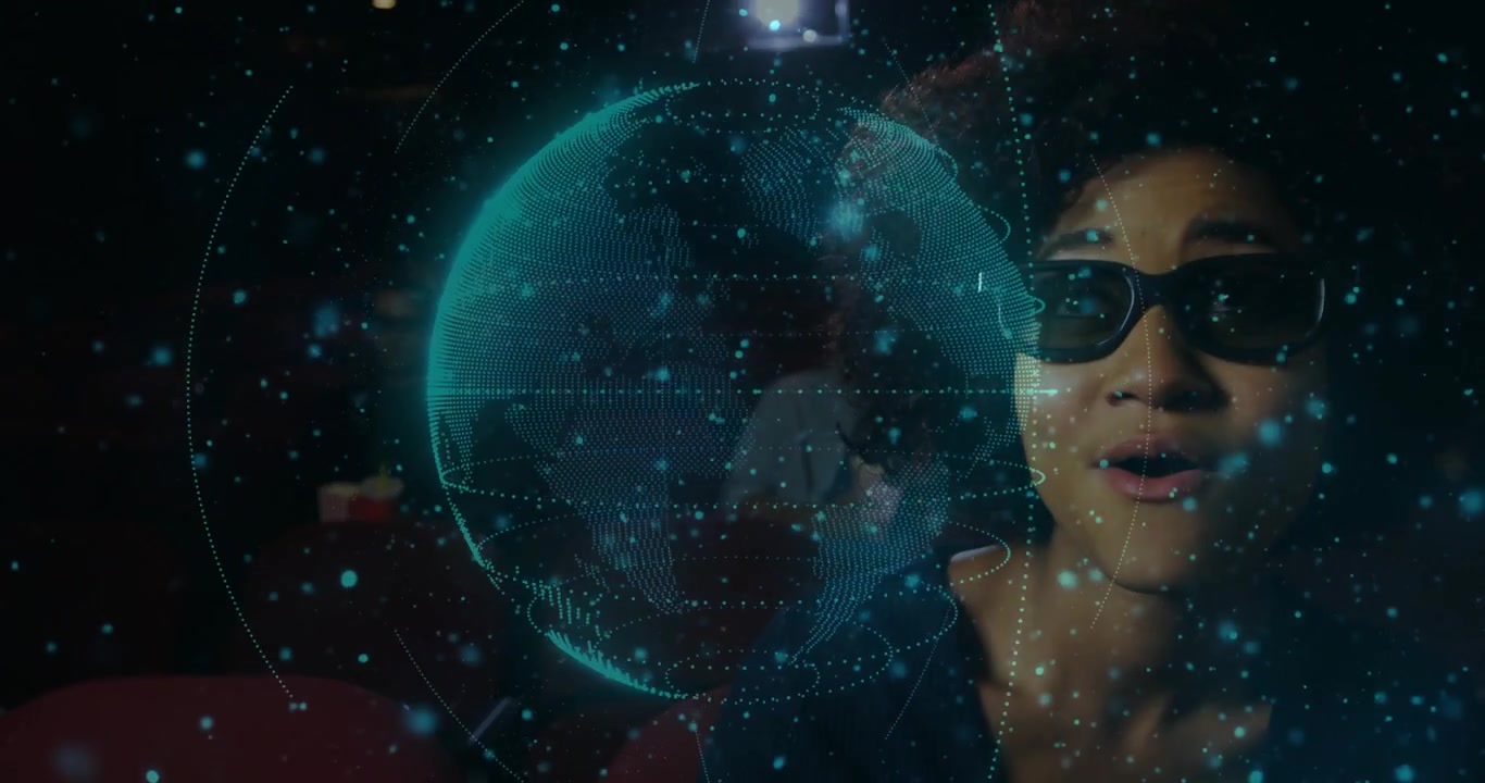 Woman wearing 3D glasses watching teal dots forming rotating holographic globe in tech demo