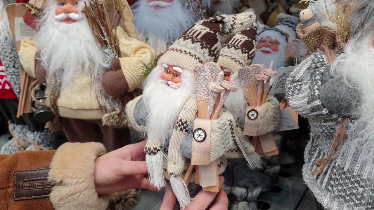 Selection and Shopping in the store for Christmas decorations for the Christmas tree.