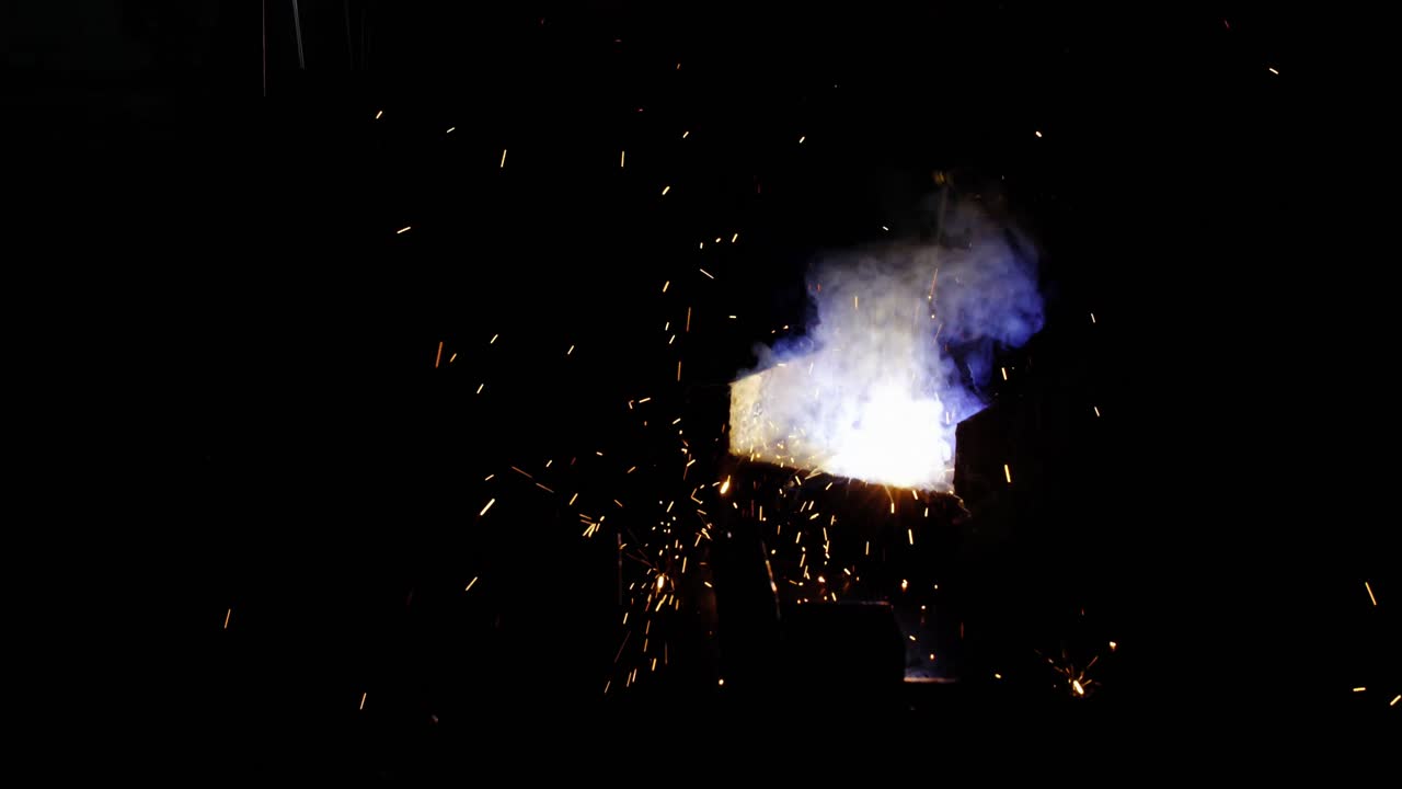 Welder welding a metal