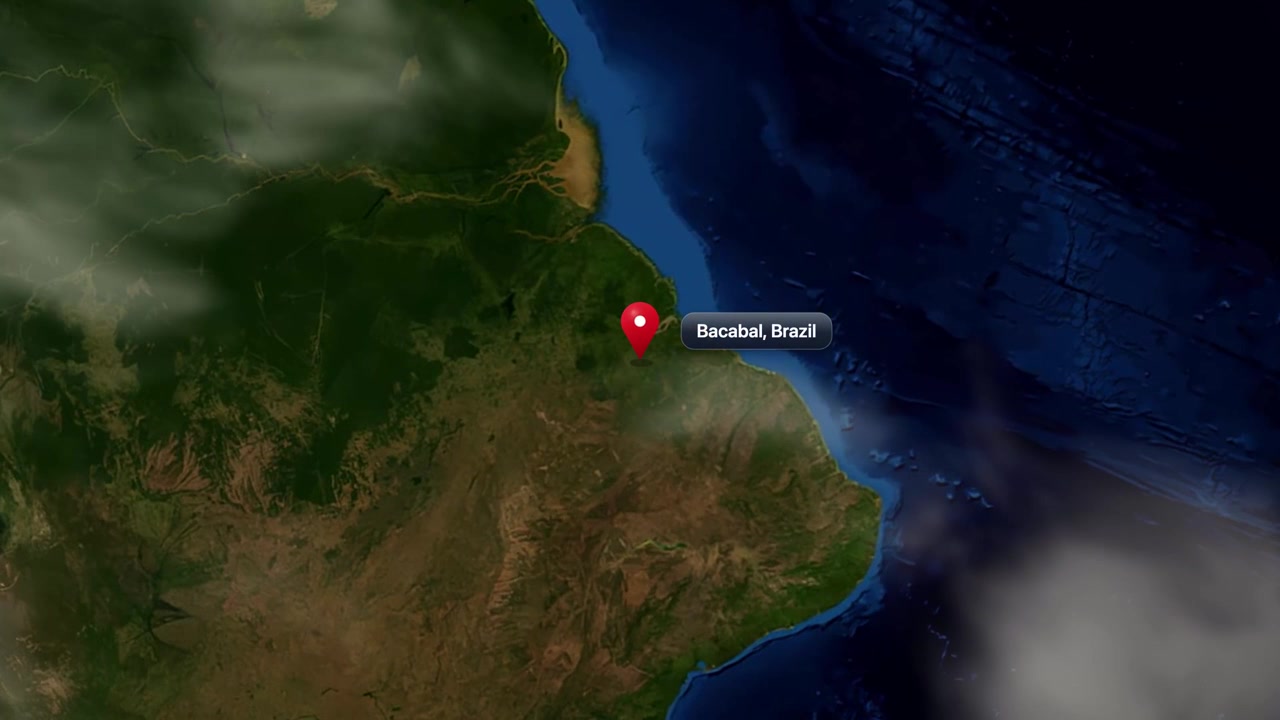 3D satellite animation zooms from global Earth view to a pin drop on Bacabal, Brazil. Includes NASA public domain imagery.