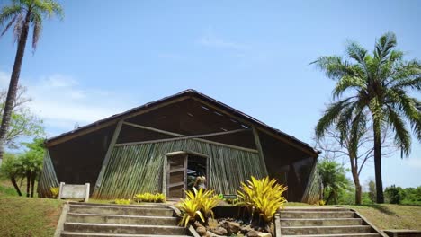 Female-tourist-entering-a-Inside-the-Pteridophytes-collection-Building-Wood-Construction-in-Bauru-City