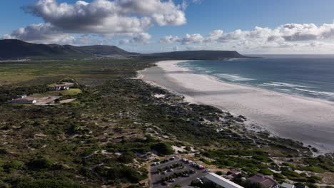 beautiful coastal view with beach and mountains