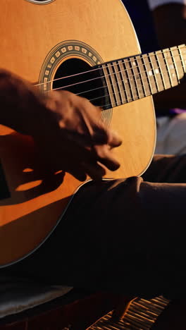beach musicians playing guitars and percussion
