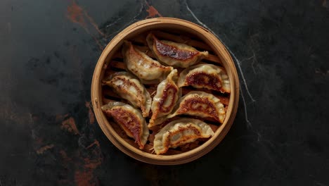 steamed dumplings in a bamboo steamer