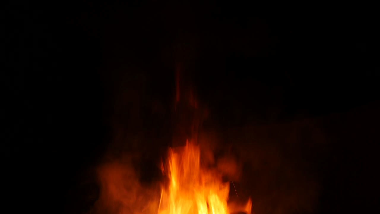 Fire flames rises up with smoke