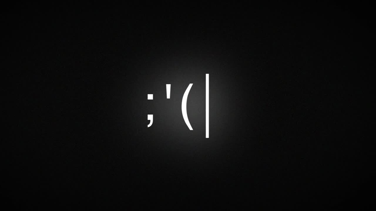 text smile on old computer monitor with blinking cursor