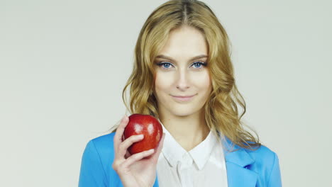 attractive woman with red apple it shows thumb up healthy lifestyle hd video