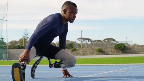 disabled athletic exercising on a running track 4k