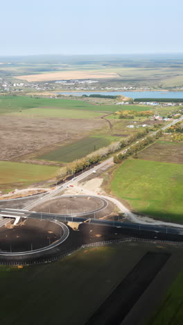 aerial view of a new road interchange and rural landscape