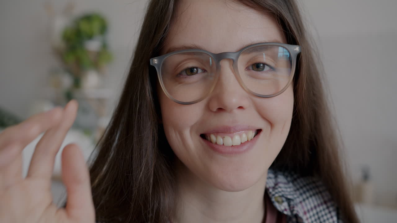 Smiling Woman Wearing Glasses