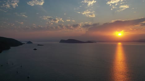 A-small-island-in-front-of-Vlychos-Plakes-Beach-in-Hydra-Island,-Greece