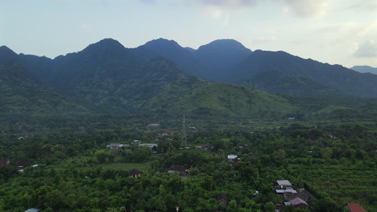 Bali village countryside around tropical lush green forest nature Indonesia Southeast Asia drone