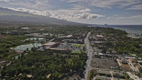 kihei maui hawaii aerial v5 drone flyover town center capturing local community businesses, laie wetland restoration site and ocean landscape views in summer - shot with mavic 3 cine - december 2022