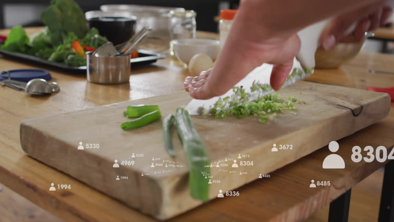 Chopping vegetables on board, animation of social media icons appearing