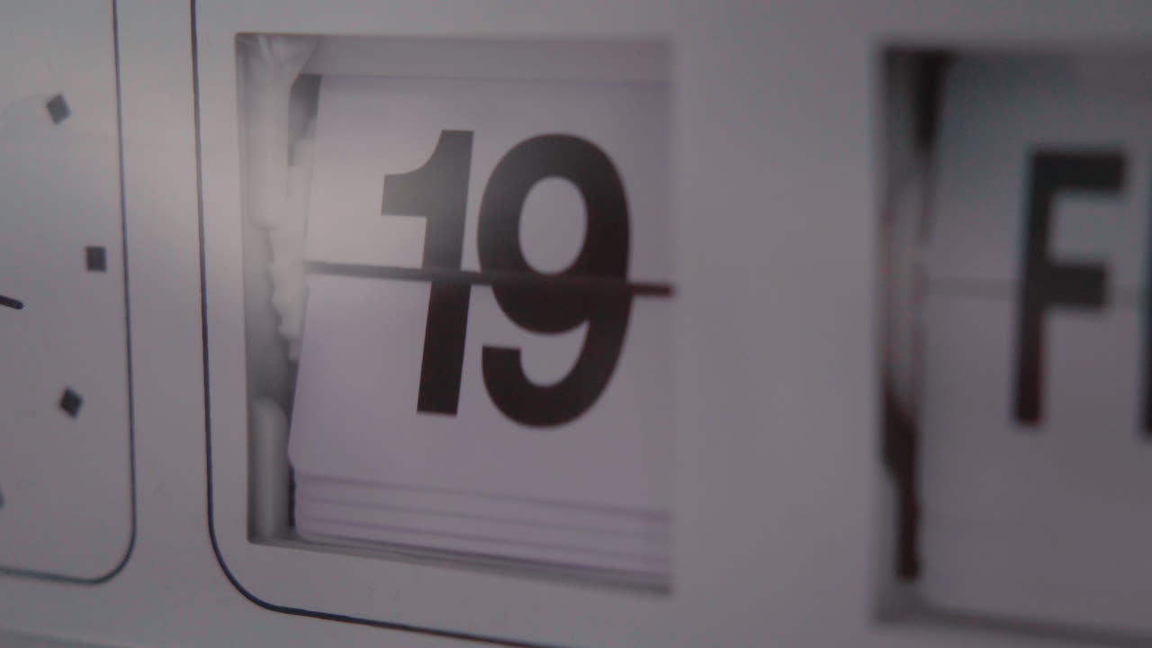 retro flip reloj calendario número de día girando rápido