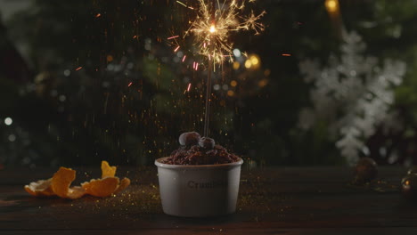 christmas dessert with confetti and sparkler