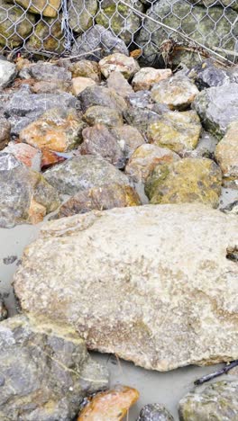 waves gently washing over rocky shoreline