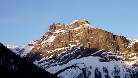 Mountain-sunrise-in-Banff,-Alberta,-Canada-on-a-calm-winter-morning-with-perfect-light