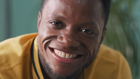 close-up portrait of a smiling african american man
