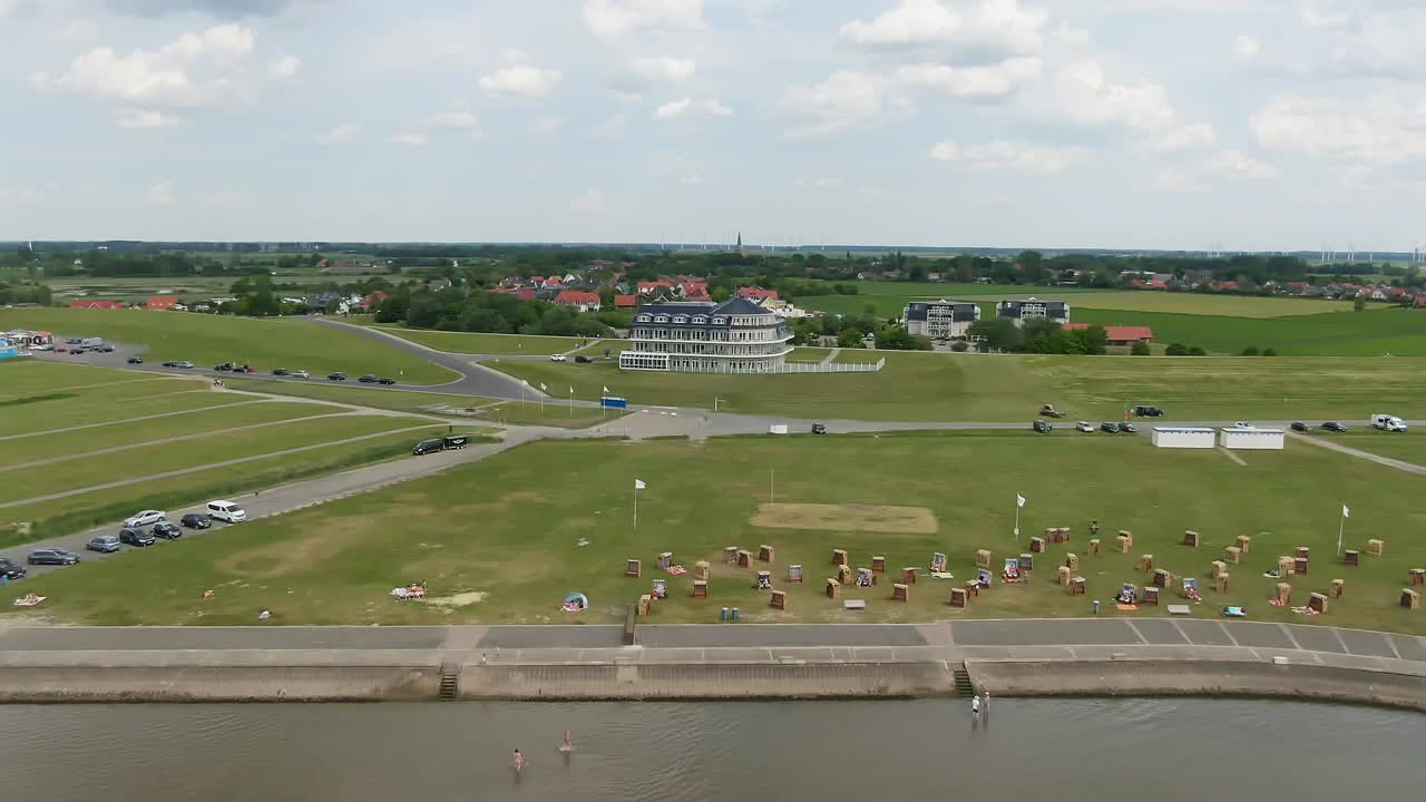 &amp;quot;A drone slowly moves away from a beautiful hotel on the North Sea coast, revealing a view of the sea