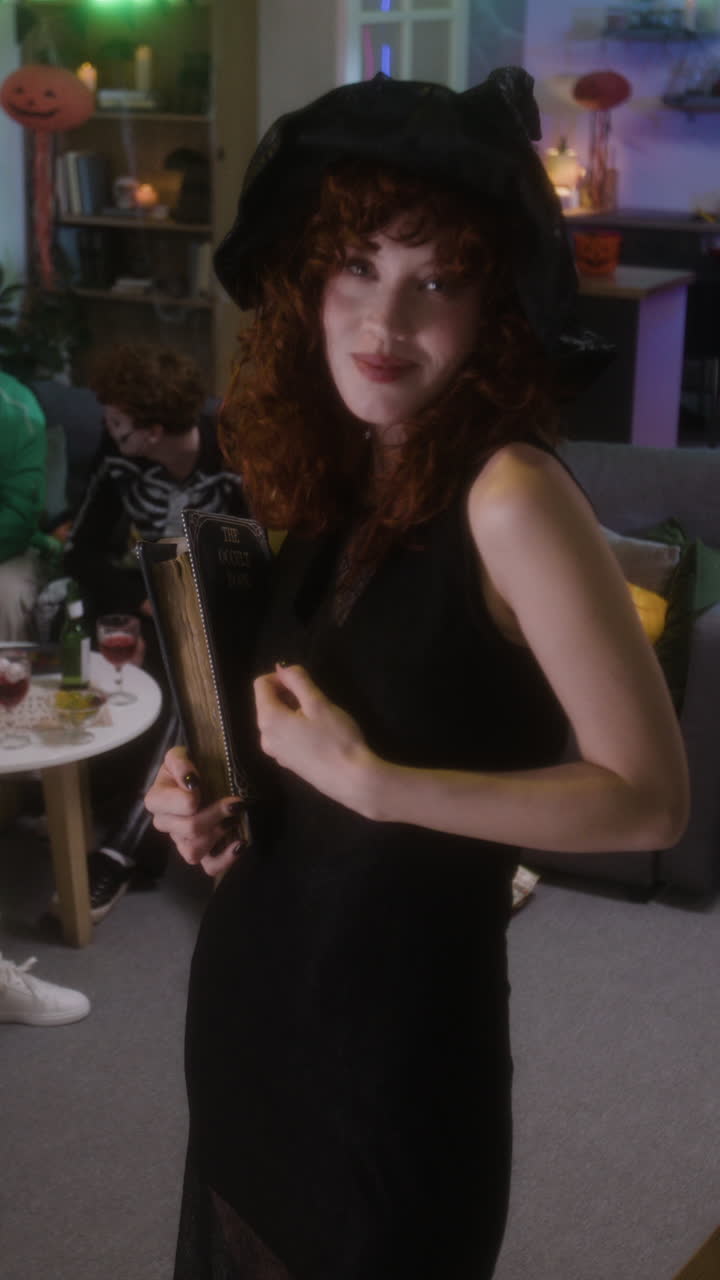Woman in Witch Costume at Halloween Party