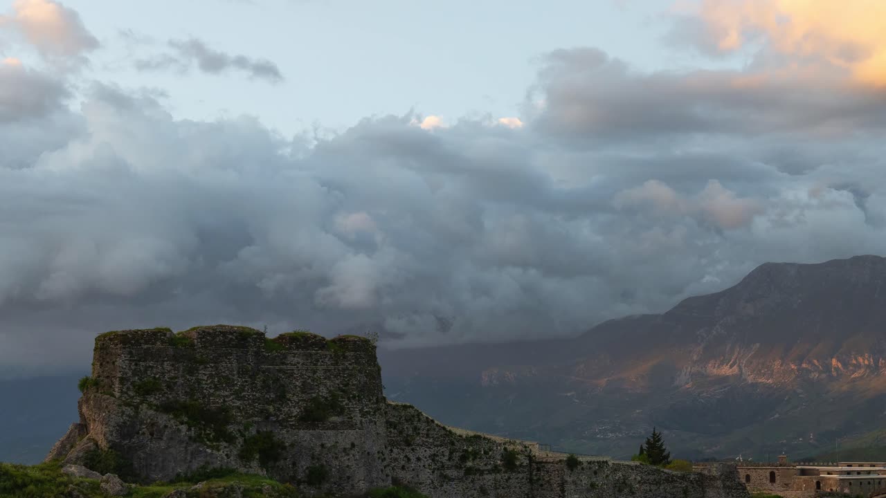 Clouds rolling over Gjirokastër castle, creating a serene atmosphere