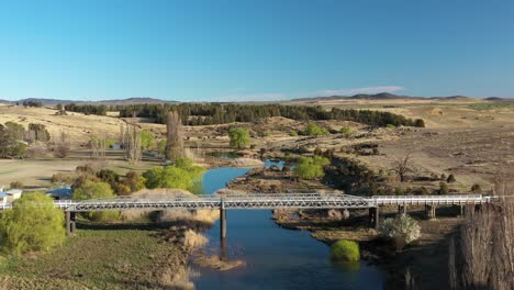 An-Excellent-Aerial-Shot-Of-Snowy-River-Surrounded-By-Arid-Land-In-New-South-Wales-Australia