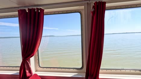 boat interior with river view through windows