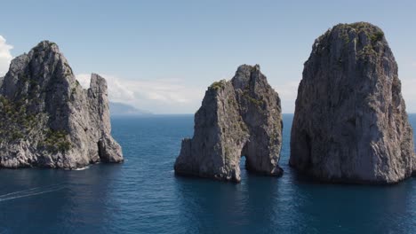 low aerial of dramatic limestone masses on capri coastline