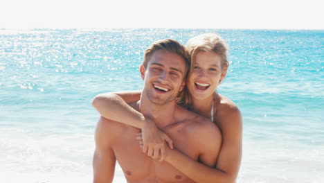 happy couple on the beach