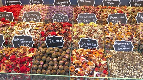 a variety of herbal teas displayed in a shop