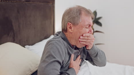 senior man coughing in bed for sickness