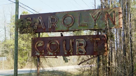 sign of the abandoned carolyn court motel in north carolina