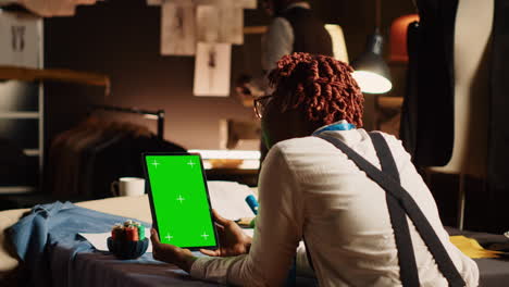 Female-tailor-working-with-greenscreen