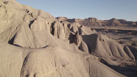 Drone-reveal-shot-of-the-hills-of-Transportation-Rock-in-Green-River,-Utah