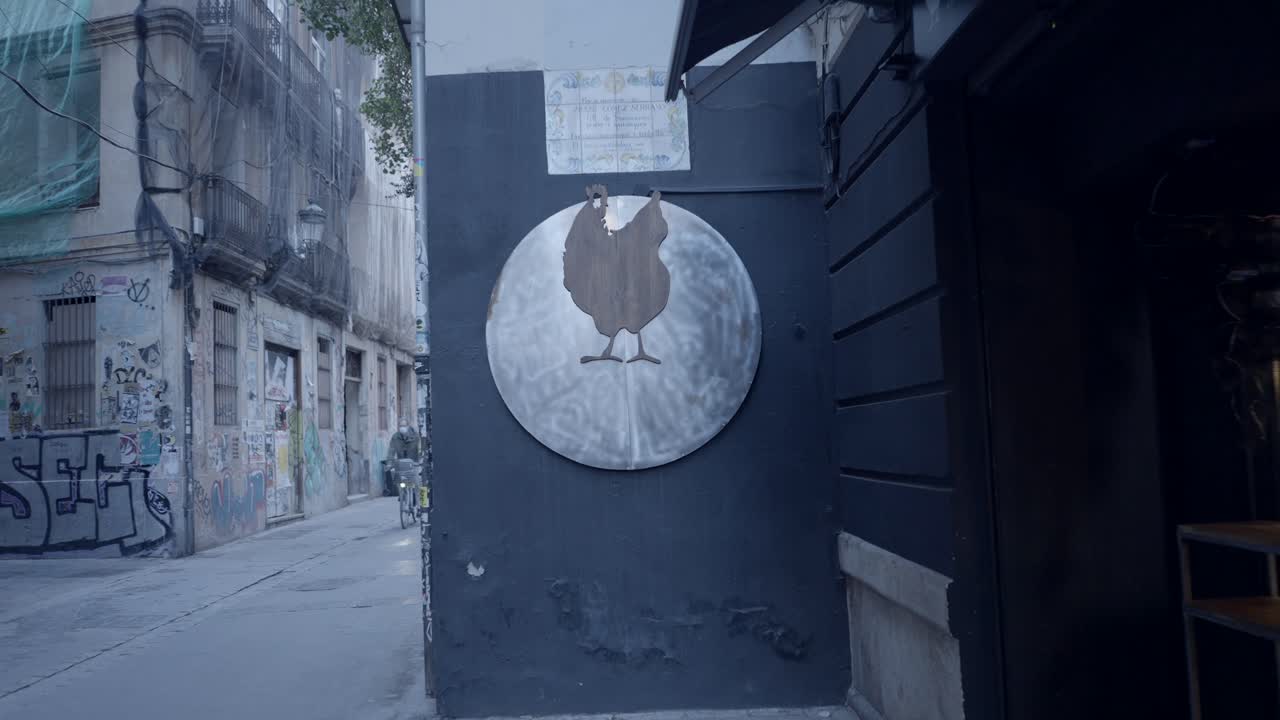 Chicken Restaurant Sign in a City Alley