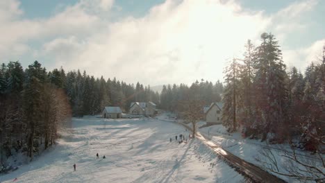 Drone-Shot-over-a-village-in-the-forest