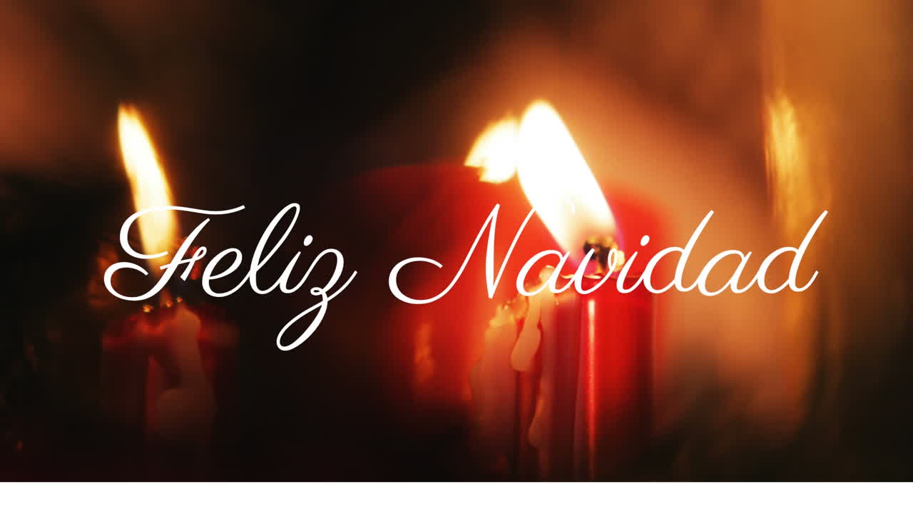 Feliz Navidad text animation over glowing candles in dark background