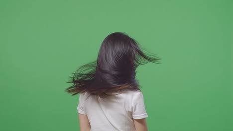 woman with long black hair, back view