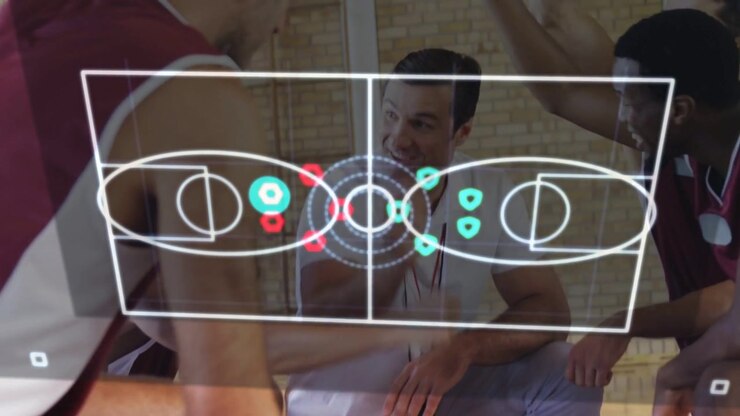Coach pointing in basketball huddle overlay forming with moving red teal dots team agreeing plan