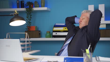 businessman finishing his work and relaxing.