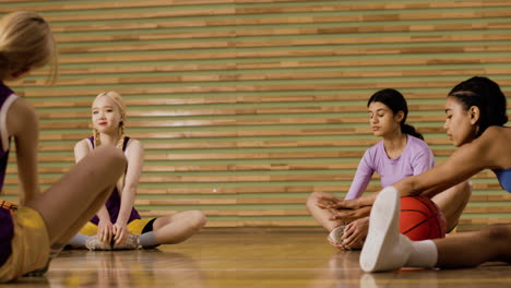 teenagers in basketball court