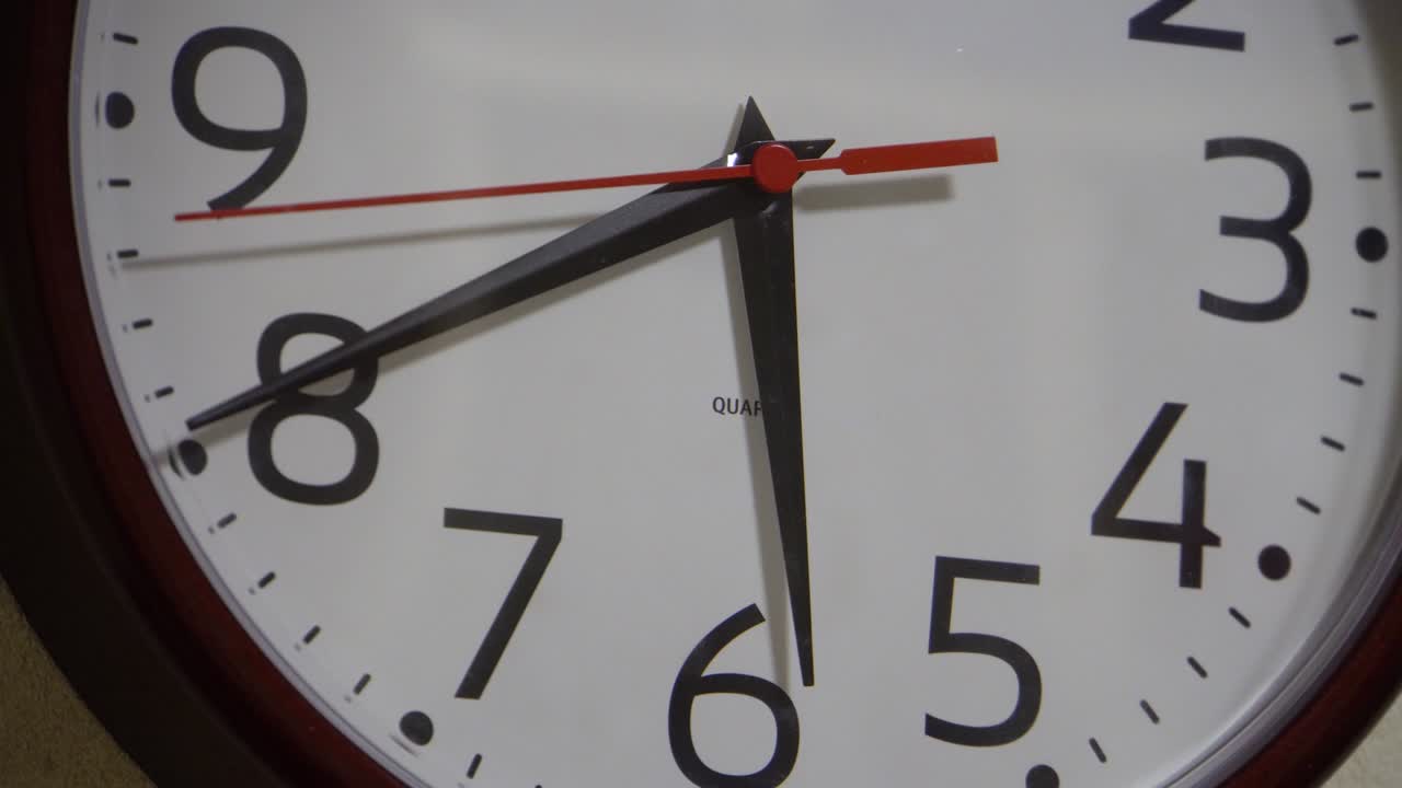 Red second hand on the clock