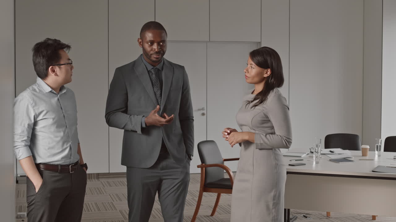 Multiethnic Businesspeople Talking in Office
