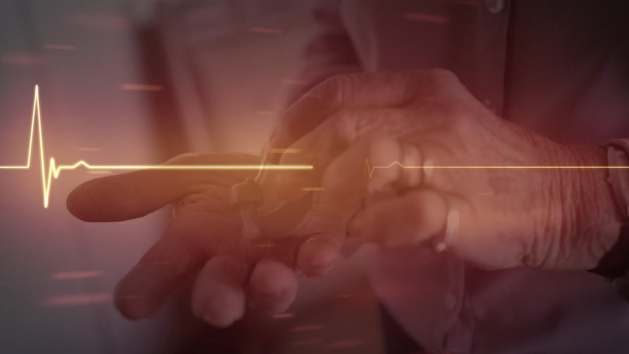 Animation of cardiograph over senior caucasian woman with hearing aid