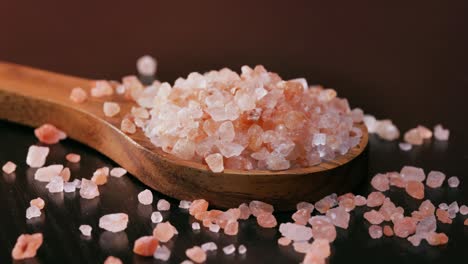 himalayan pink salt in a wooden is used to flavor food. due mainly to marketing costs, pink himalayan salt is up to twenty times more expensive than table or sea salt.