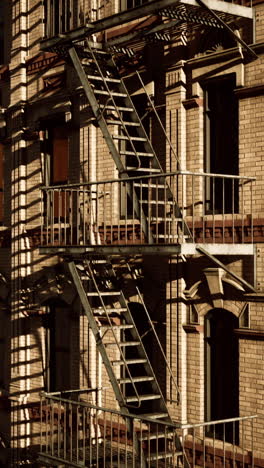 old brick building with fire escape