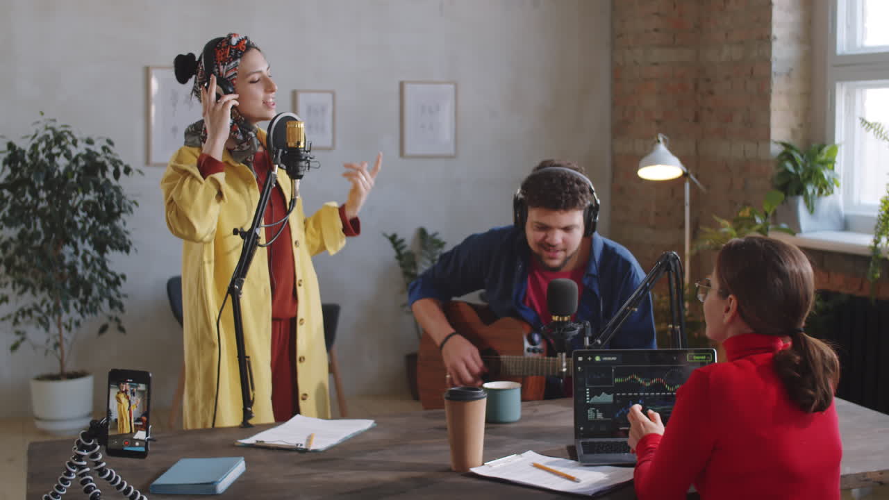 Music Duo Singing in Recording Studio during Livestream Concert